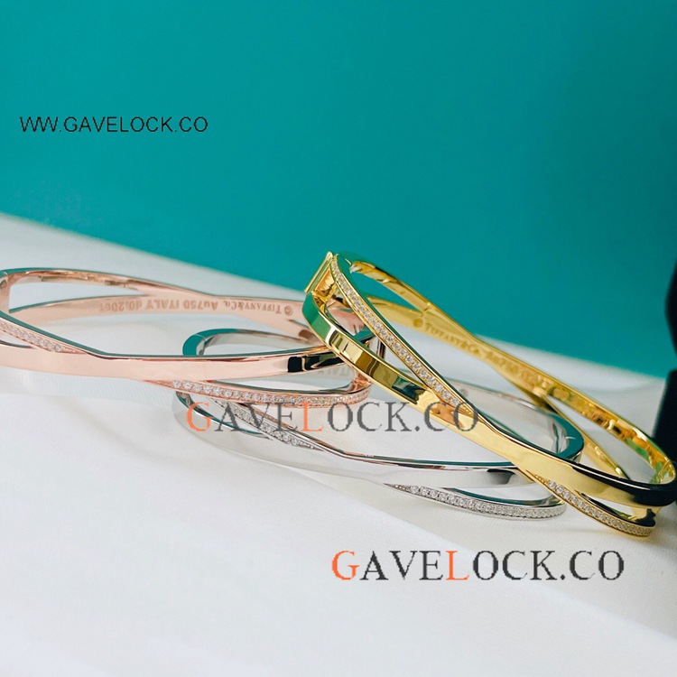 Tiffiny and Co Cross Bangle set with half diamonds